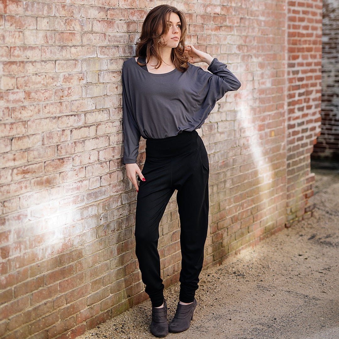 pop top in carbon worn tucked into black joggers