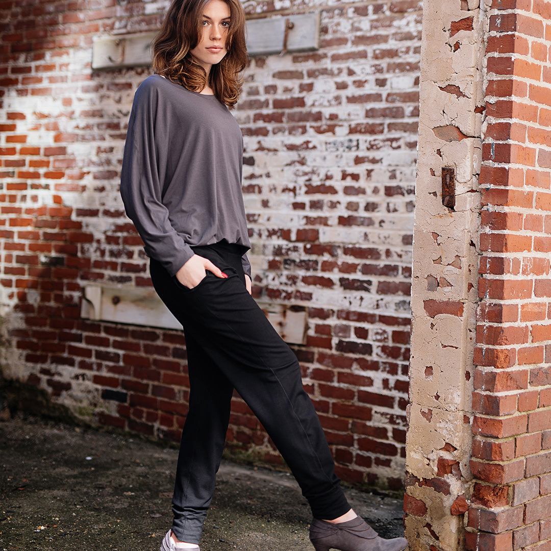 jogger in black with pop top in carbon tucked into waistband