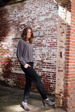 jogger in black with pop top in carbon tucked into waistband