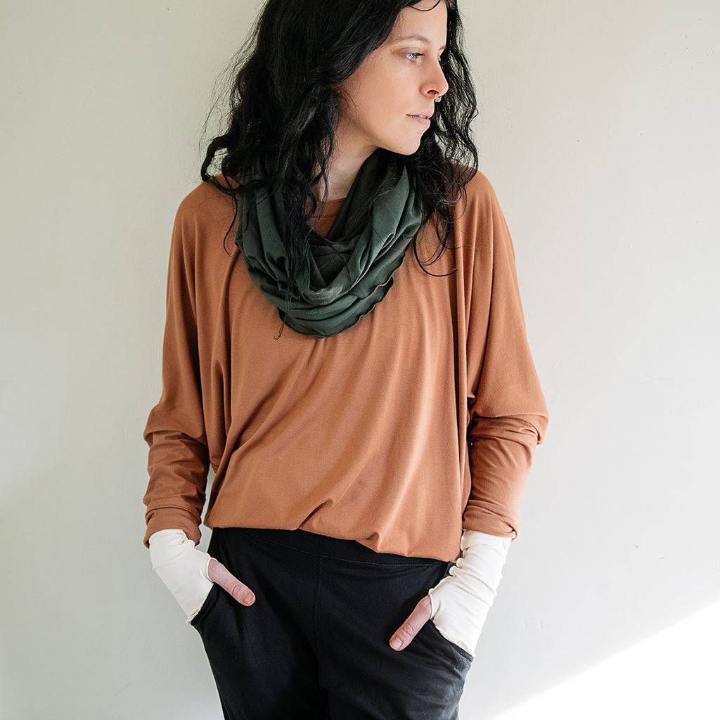 pop top in cedar paired with black jogger and fir loop around neck