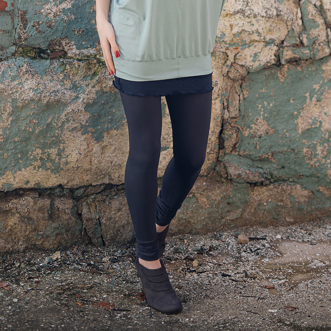 base legging in carbon paired with pop top in glass and hourglass in midnight worn as a skirt