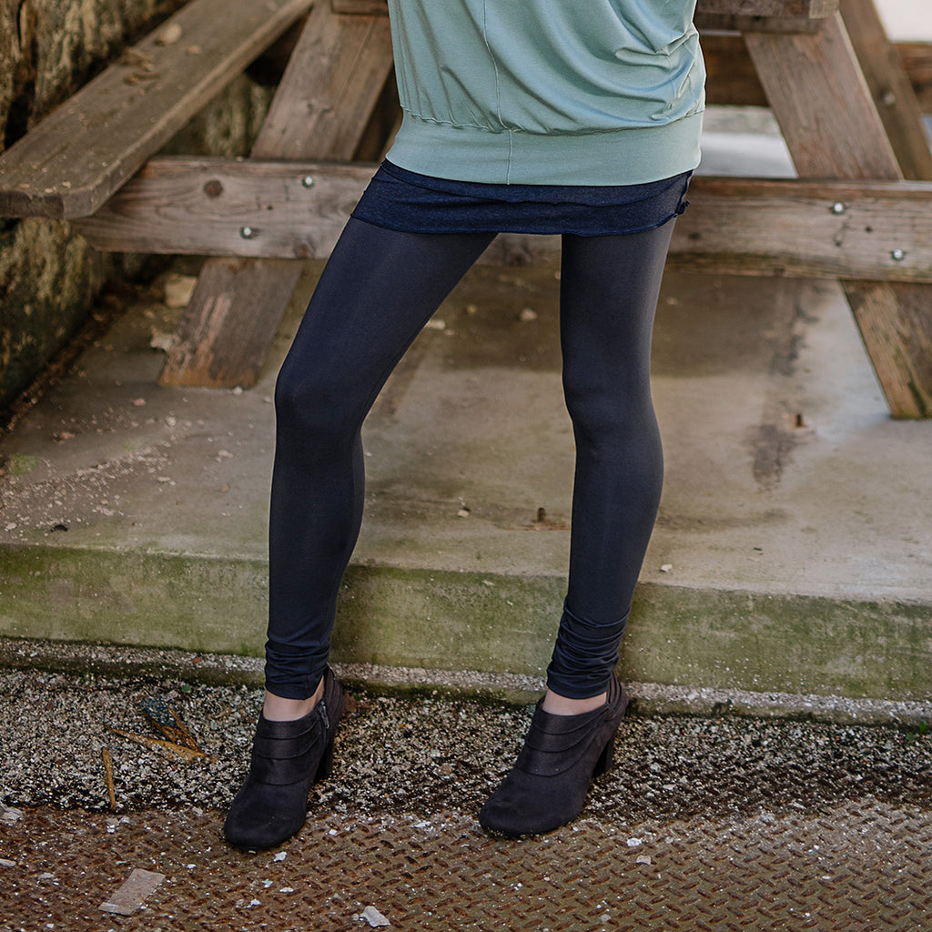 base legging in carbon paired with pop top in glass and hourglass in midnight worn as a skirt