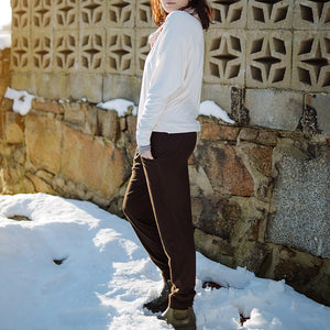 jogger in peat paired with pop top in milk, ballet hourglass around neck, and moon opera sleeves