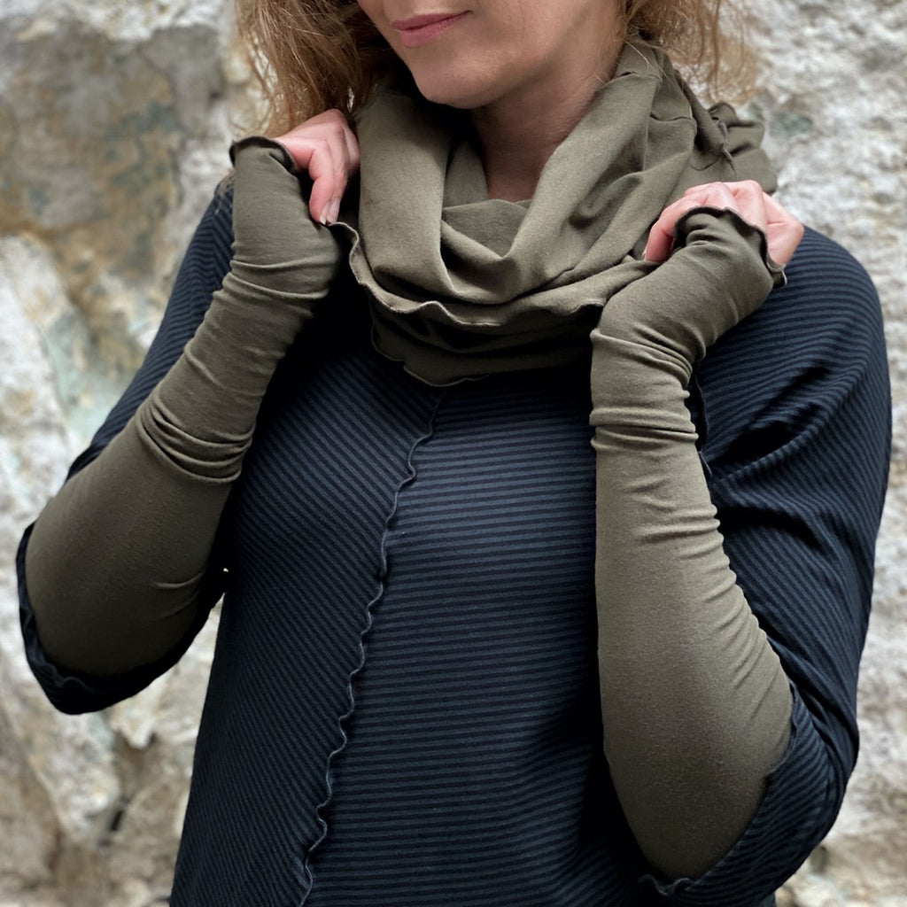 olive opera sleeves and hourglass cowl complement subtle black swing tunic