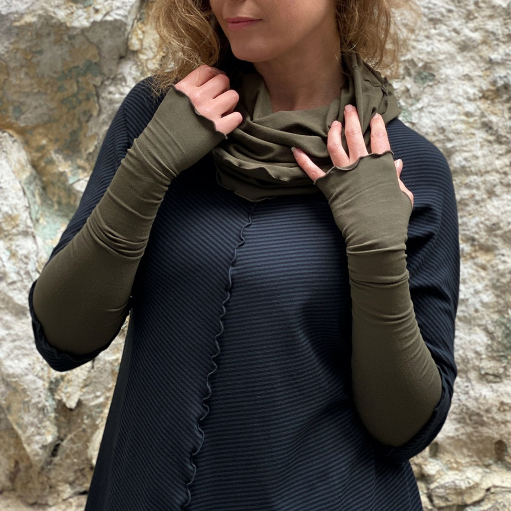 olive opera sleeves and hourglass cowl complement subtle black swing tunic