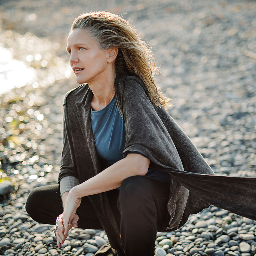 the wrap as a shawl in mineral black stitch, rose top in lake, jogger in black