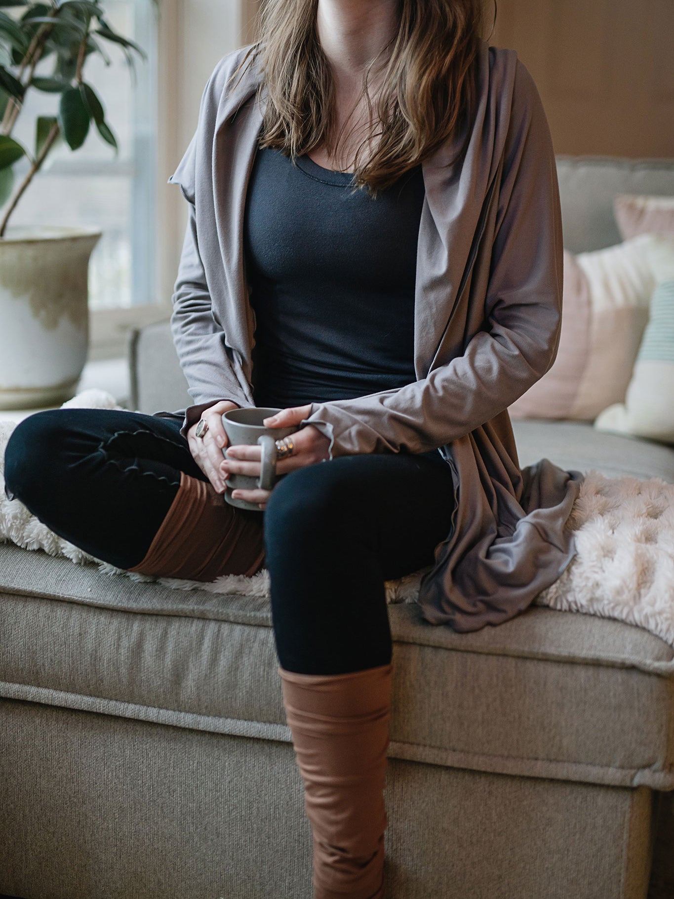 core tank in carbon with cardi jacket in moon, playsuit in black, and cedar stockings