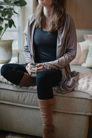 core tank in carbon with cardi jacket in moon, playsuit in black, and cedar stockings