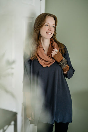 swing top in carbon paired with black playsuit, cedar hourglass around neck, and almond aria gloves