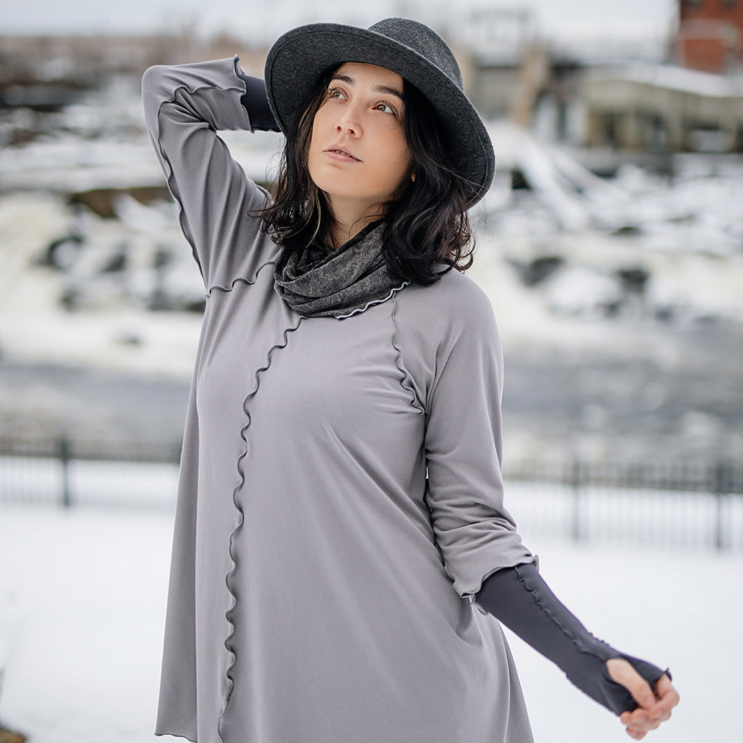 swing top in moon with carbon opera sleeves and mineral hourglass at neck