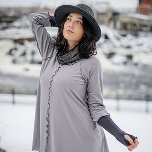 swing top in moon with carbon opera sleeves and mineral hourglass at neck