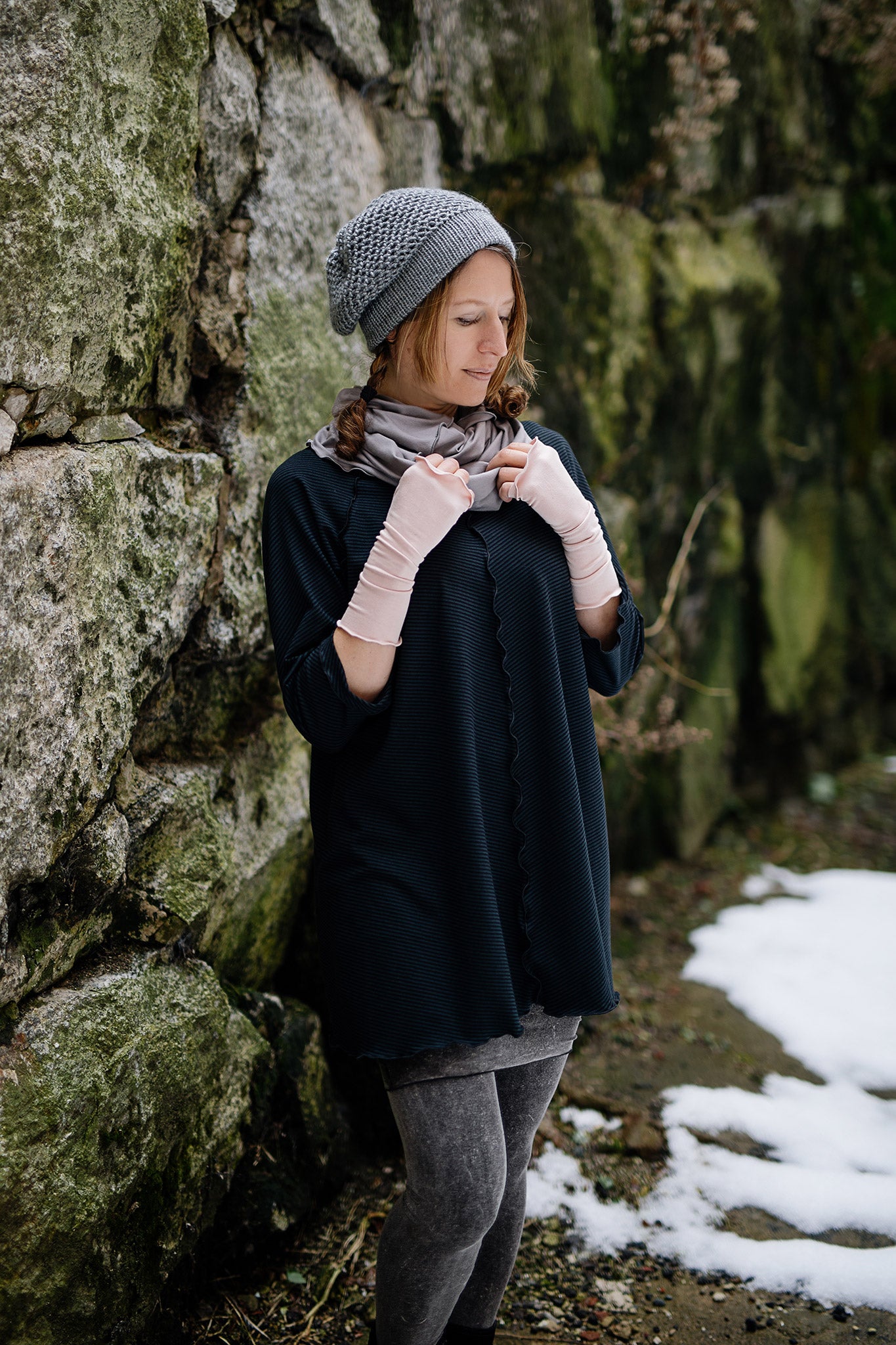 swing top in subtle black with hourglass at neck in moon, ballet aria sleeves, and mineral playsuit