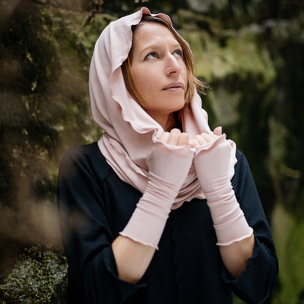 loop infinity scarf in ballet as a hood with ballet aria sleeves and subtle black swing top