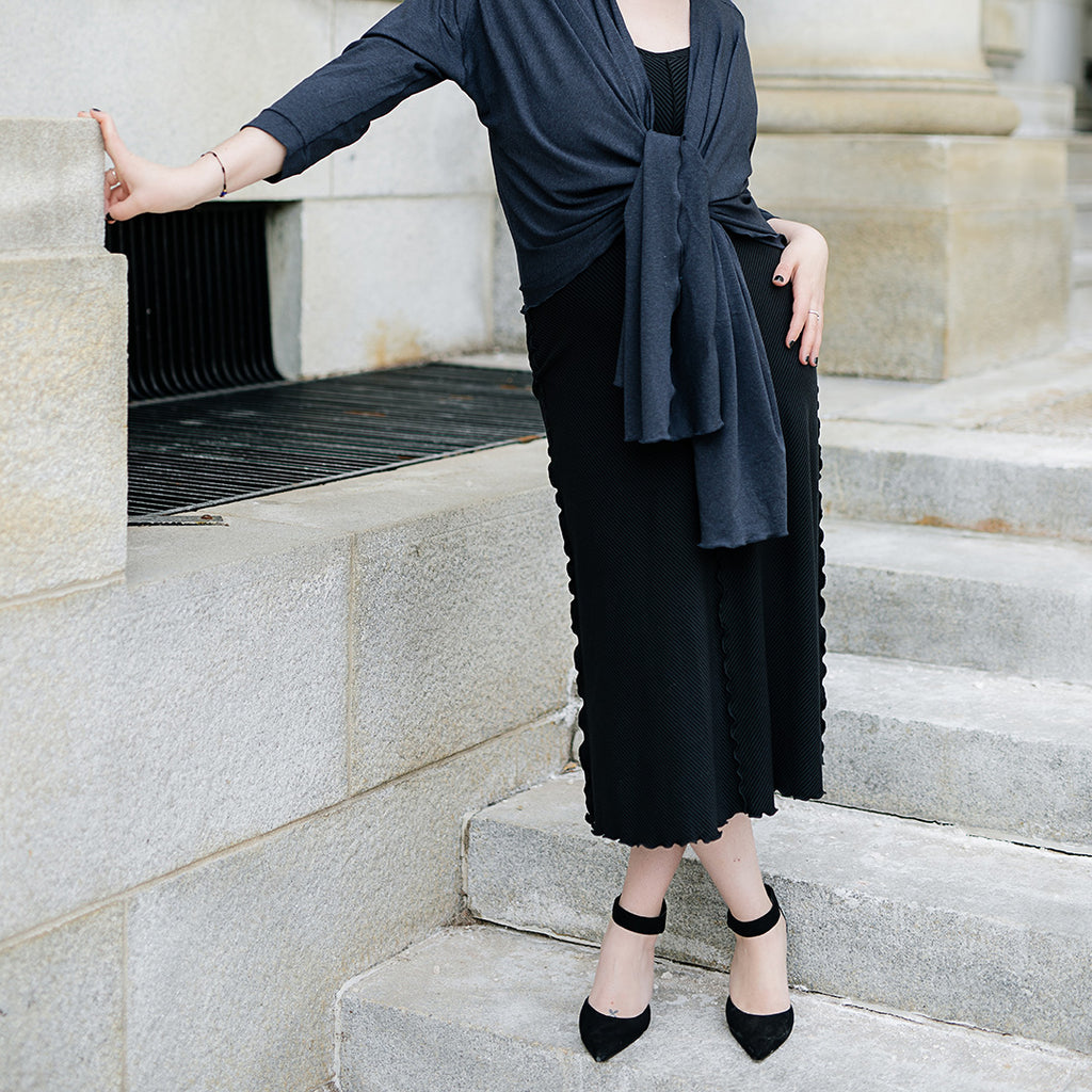 goddess dress in subtle black with midnight prima wrap jacket tied in the front