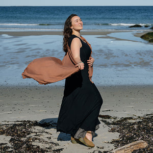 glow gown in black worn with shawl in cedar