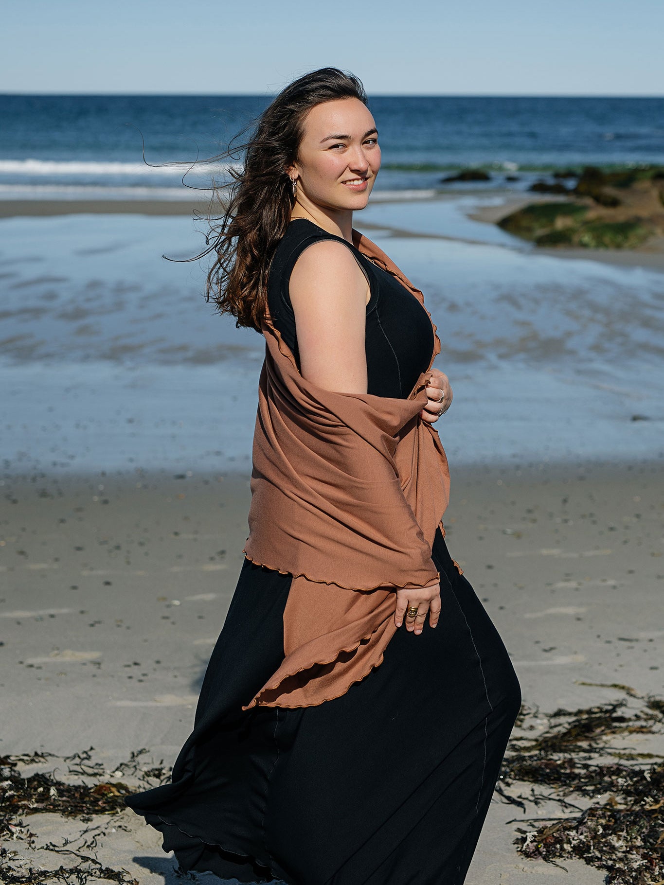 glow gown in black worn with shawl in cedar