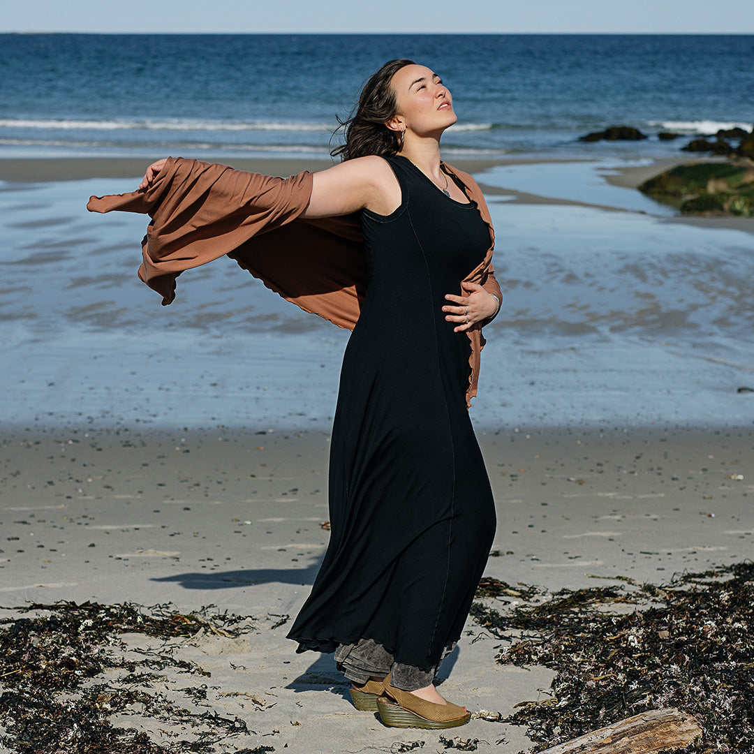 glow gown in black worn with shawl in cedar