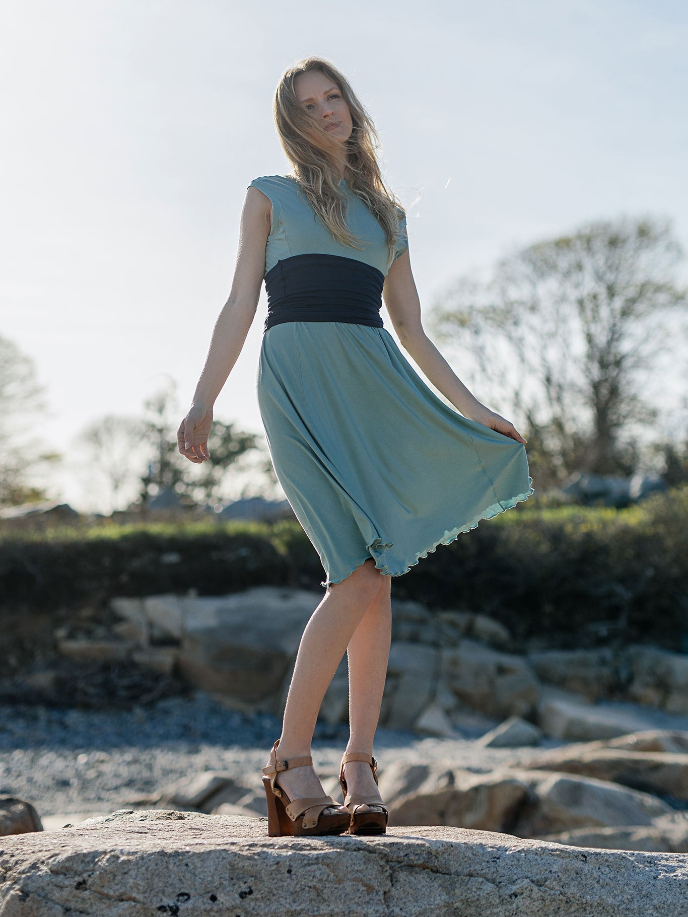 glow dress in glass with navy corset as a belt