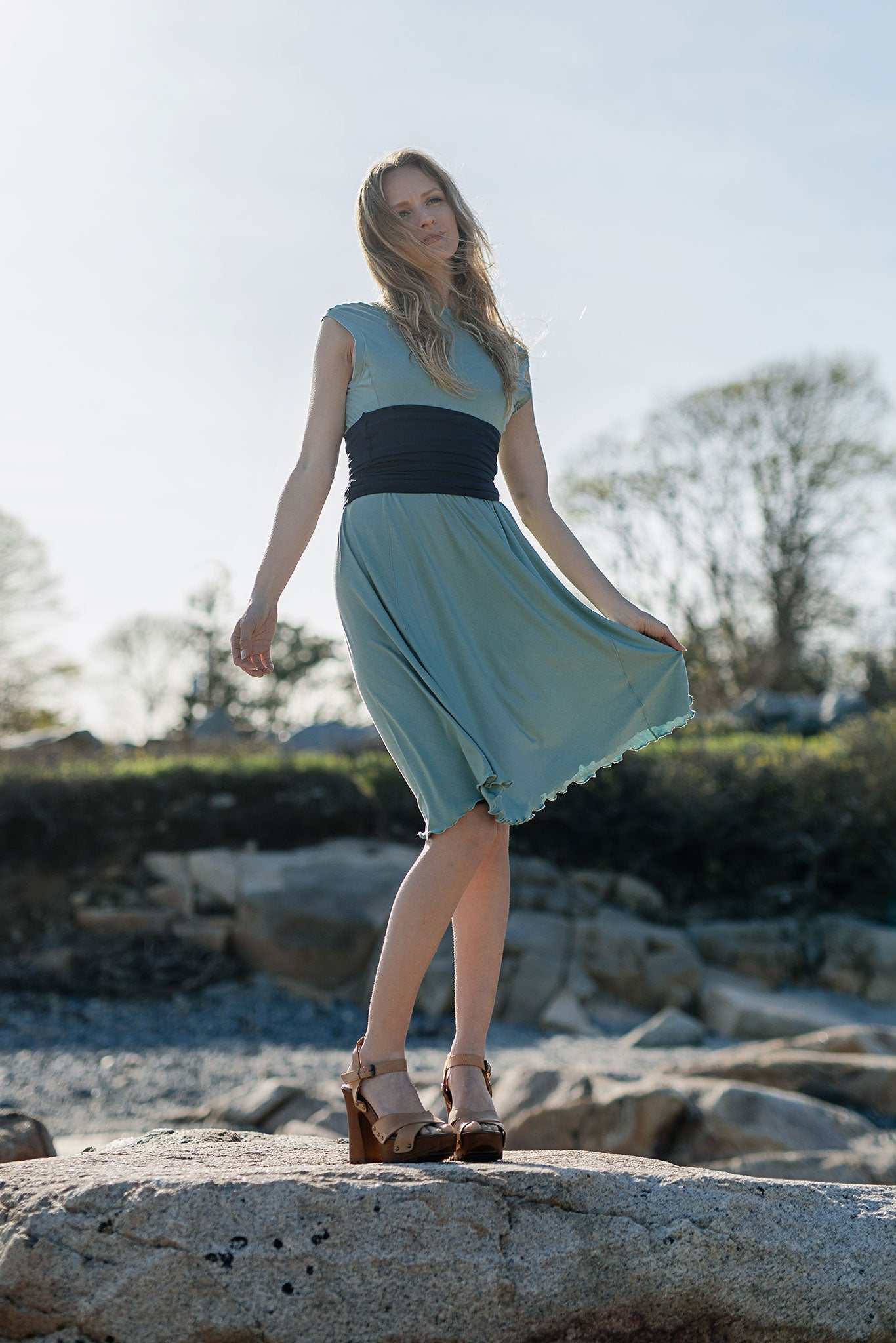 glow dress in glass with navy corset as a belt