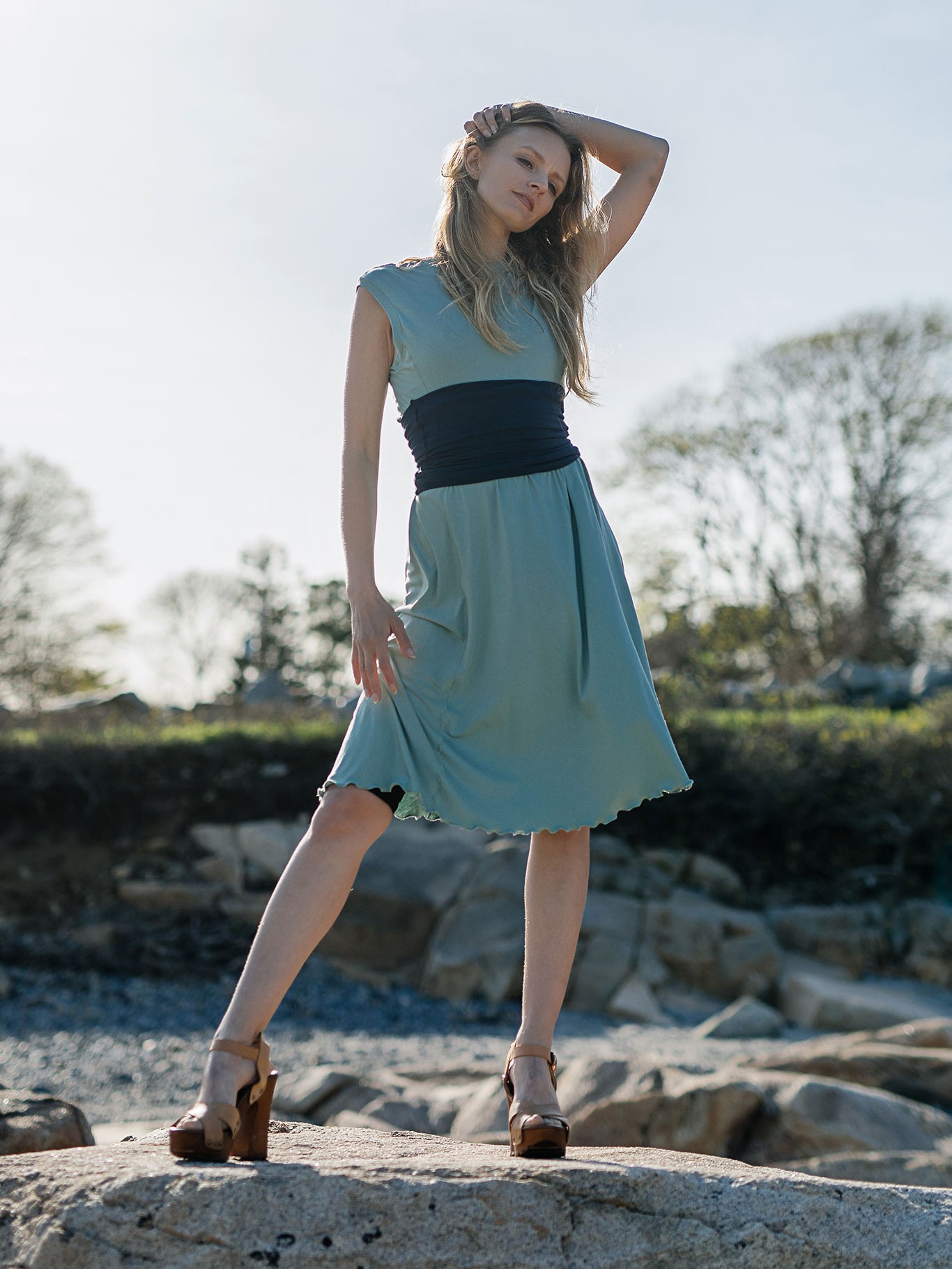 glow dress in glass with navy corset as a belt