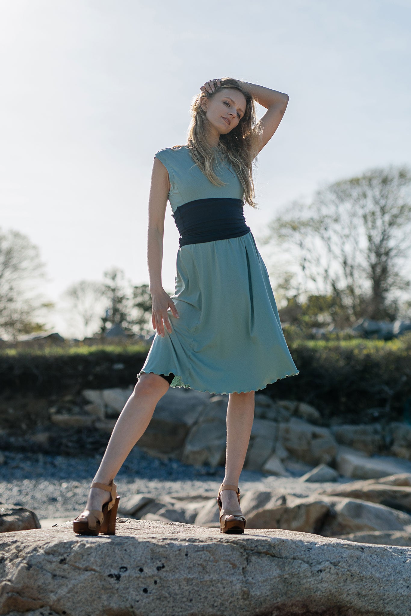 glow dress in glass with navy corset as a belt