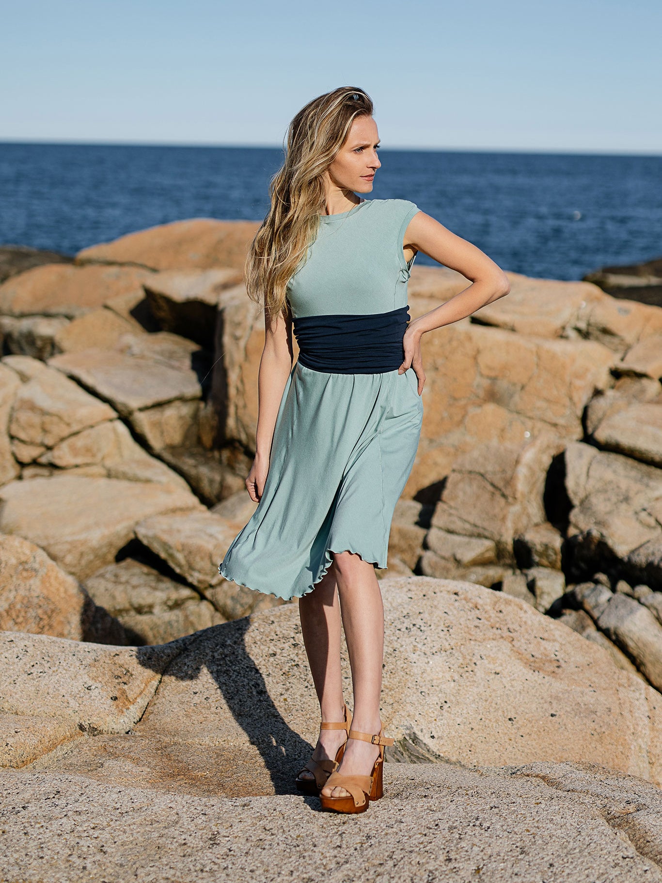 glow dress in glass with navy corset as a belt