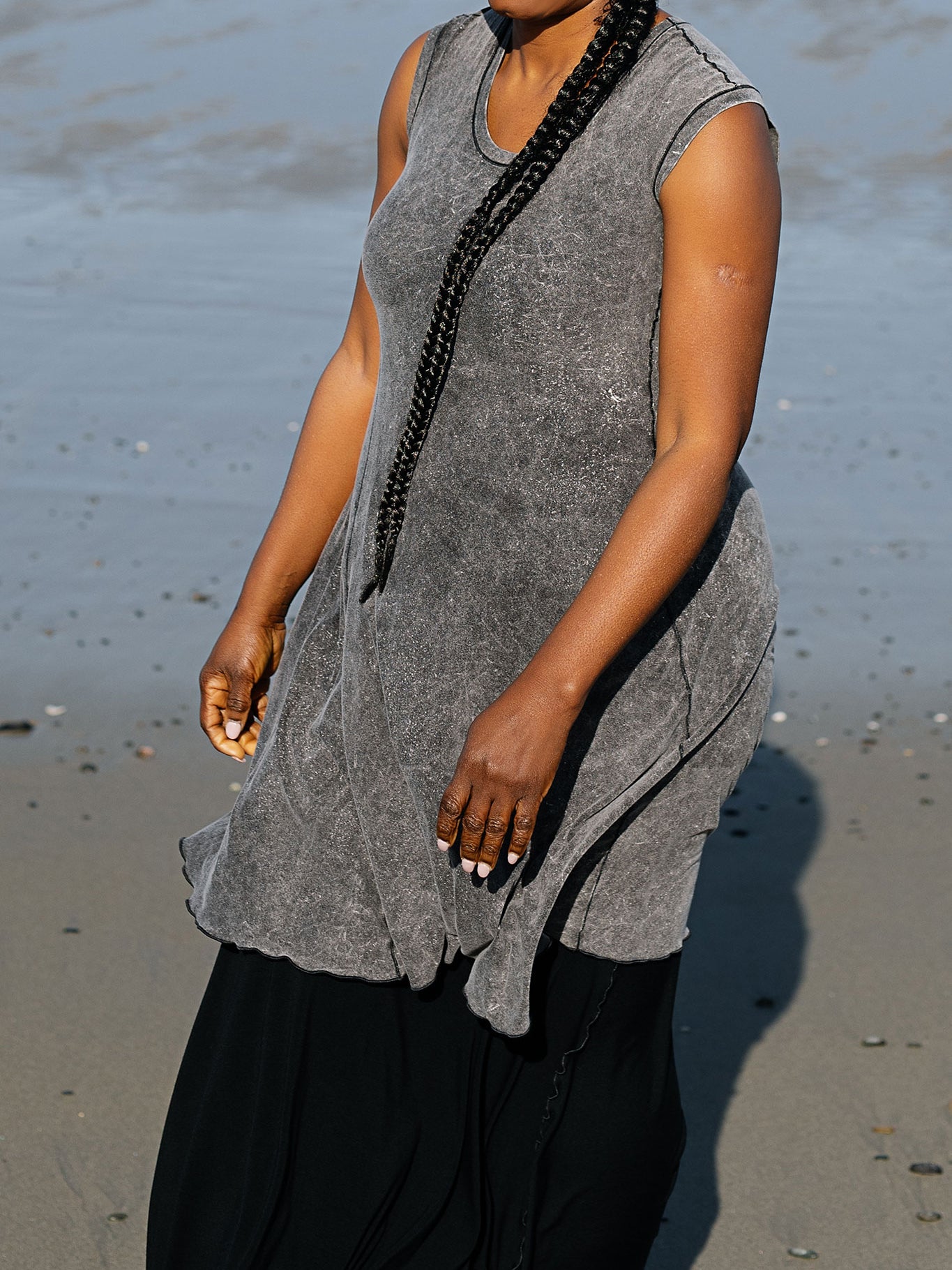 glow dress in black stitch mineral worn over lady flirt in black worn as a skirt