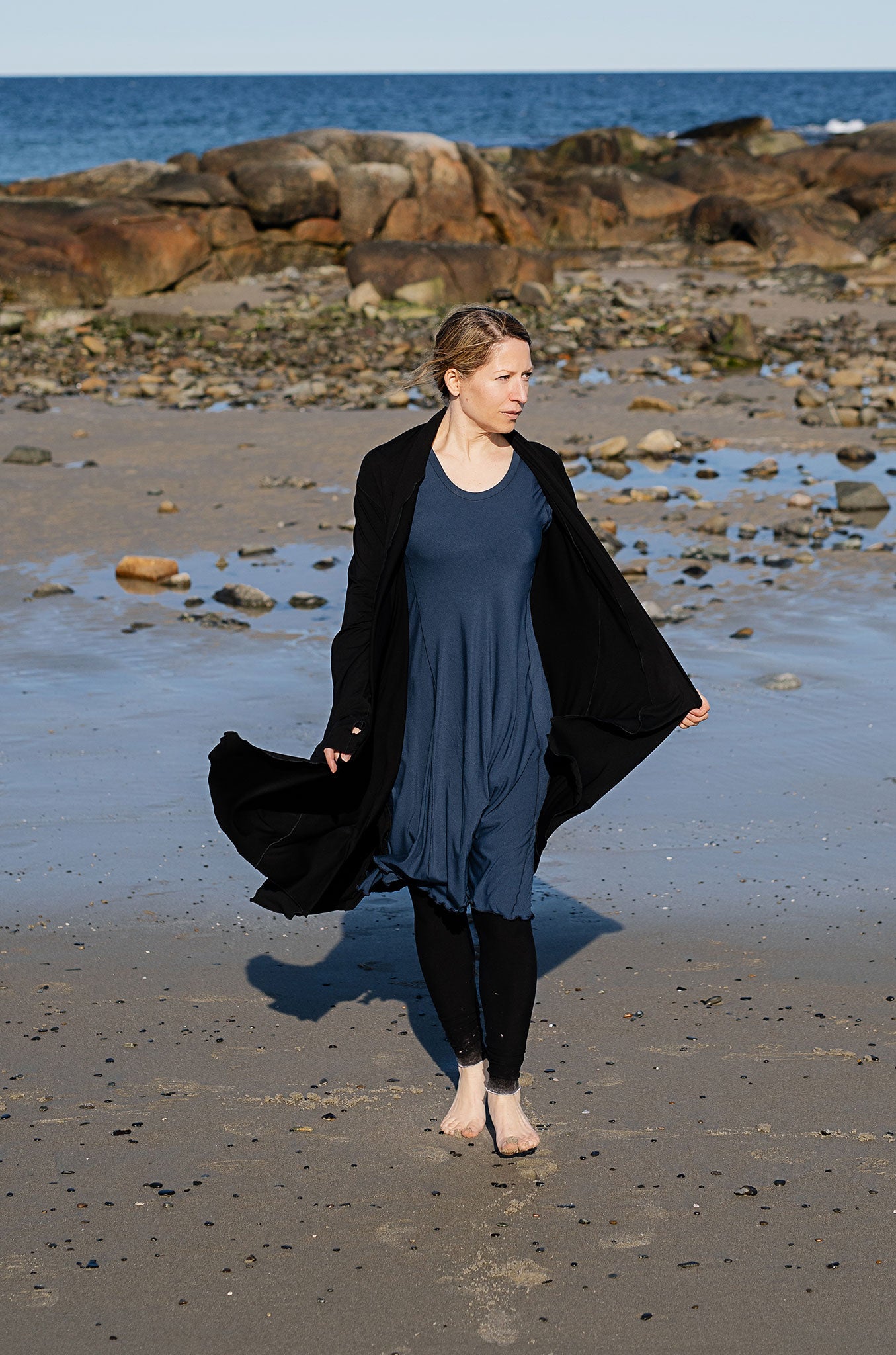 glow dress in navy with garden coat in black