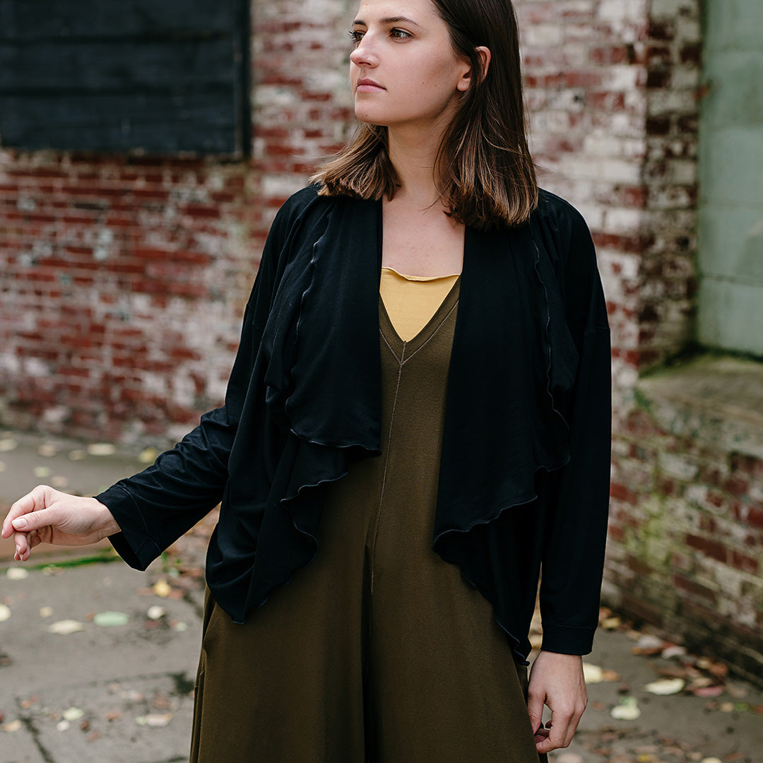 prima wrap jacket in black over olive farmer