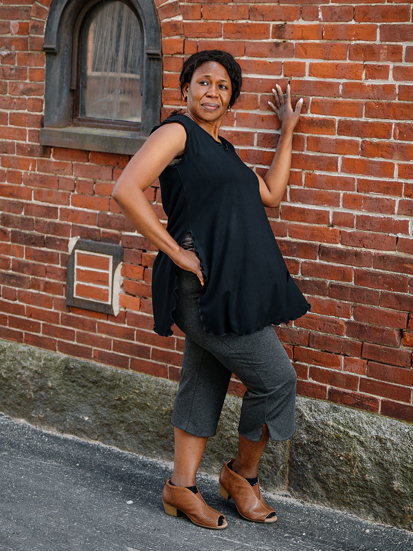 doublet layer top in black paired with kick pant in charcoal