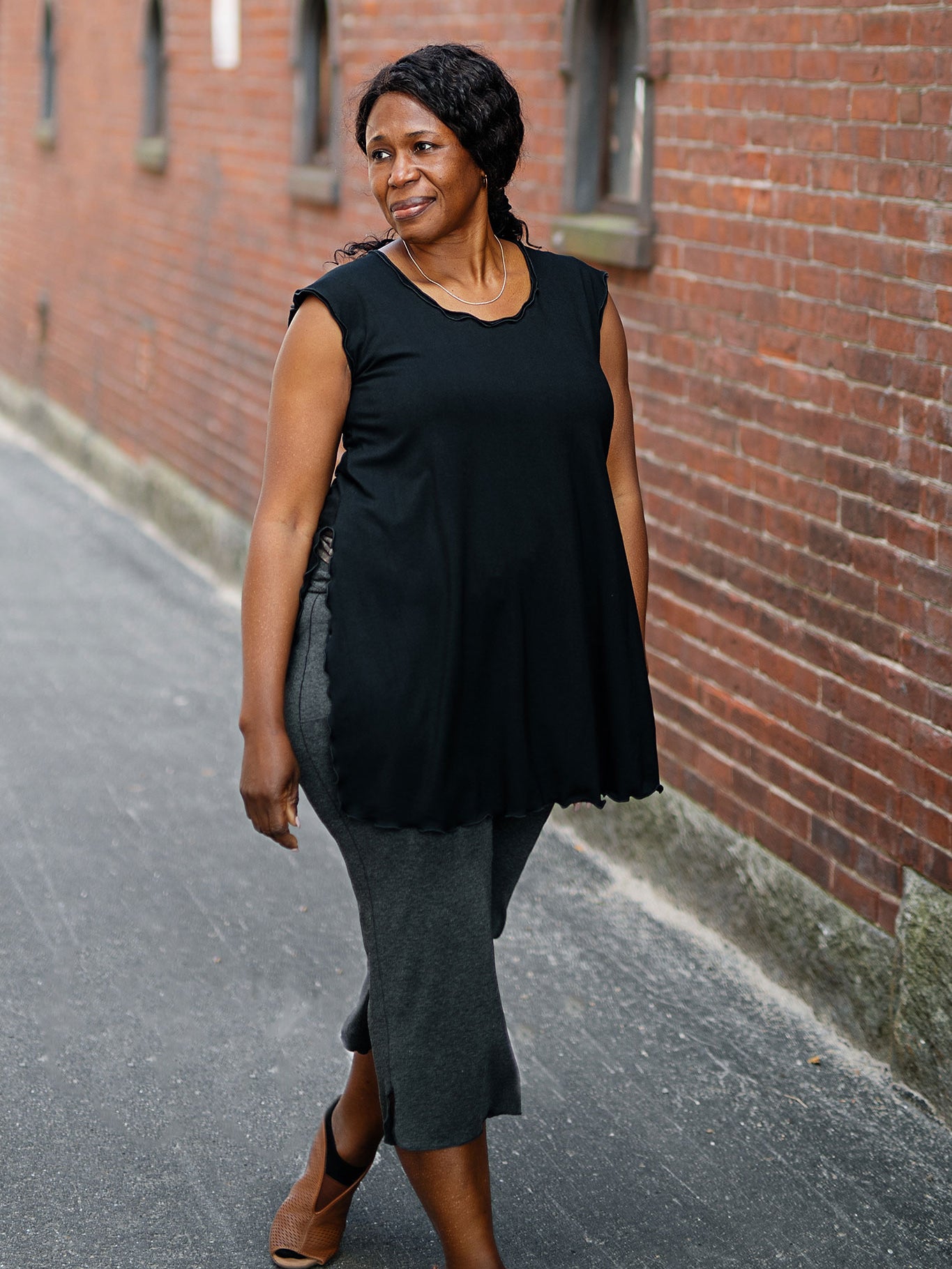 doublet layer top in black paired with kick pant in charcoal