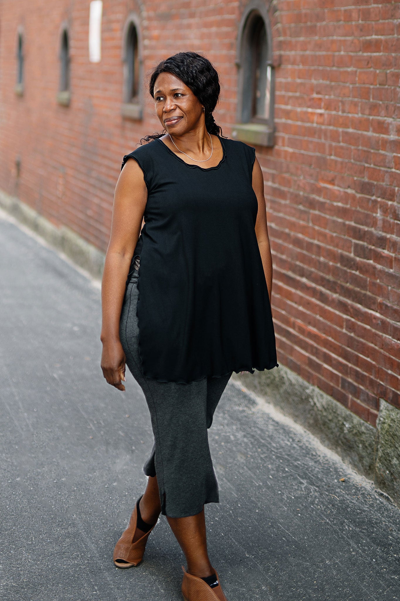 doublet layer top in black paired with kick pant in charcoal