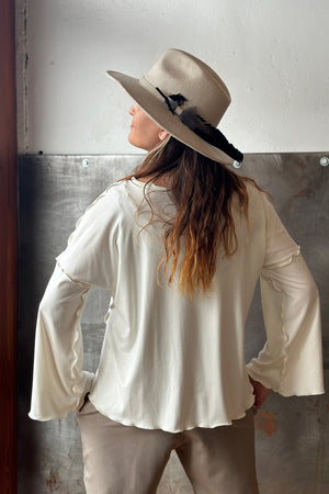 angelrox® truly in milk worn with clay joggers