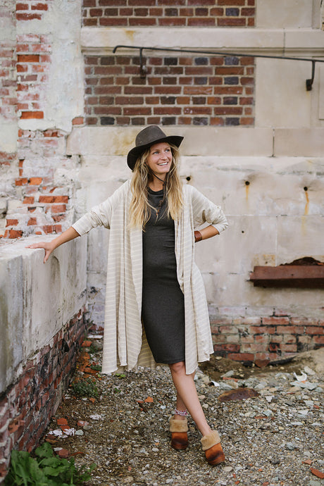 garden coat in dune over sheath dress in charcoal