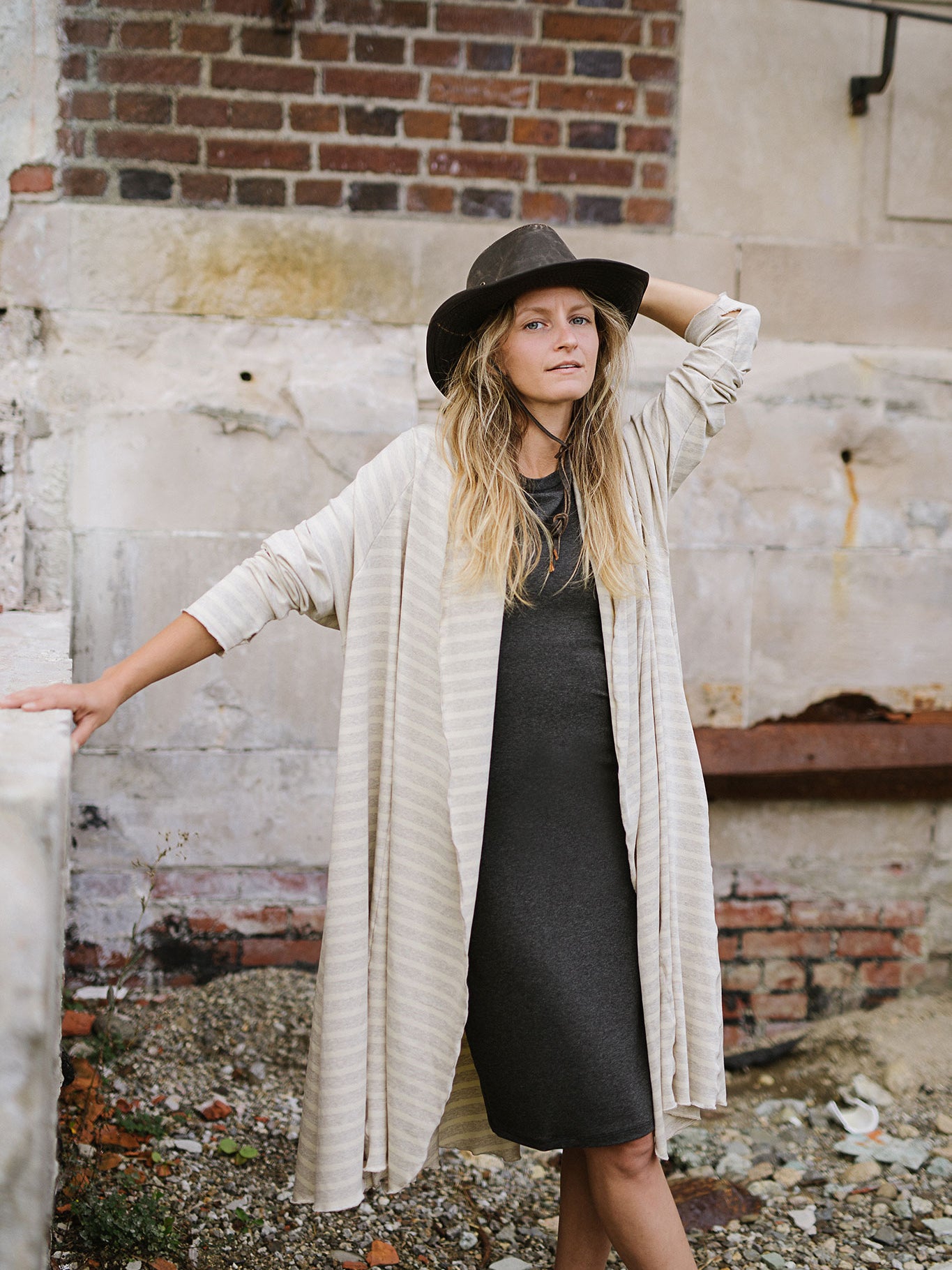 garden coat in dune over sheath dress in charcoal