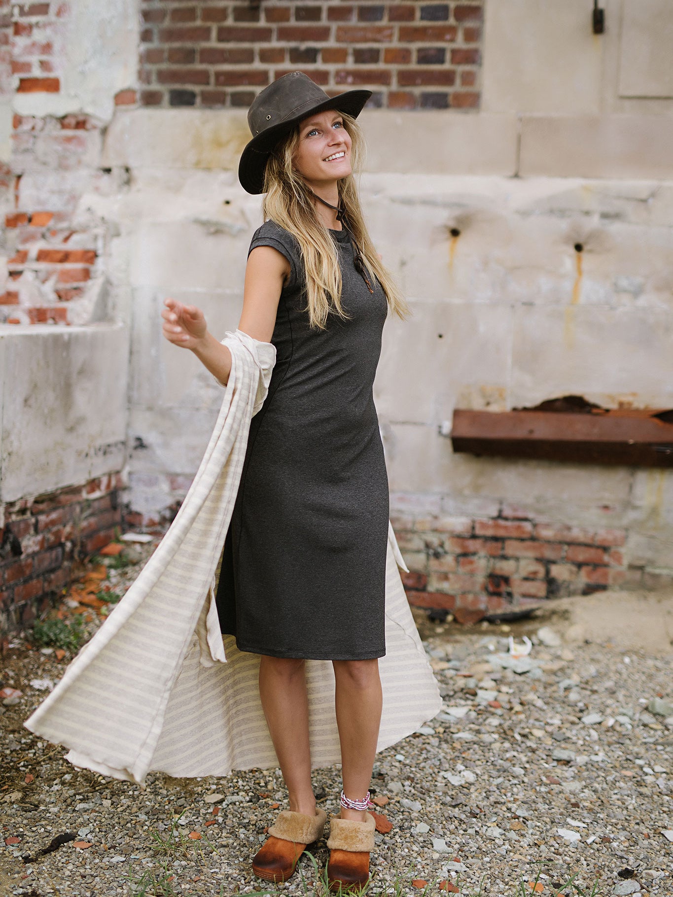 garden coat in dune over sheath dress in charcoal