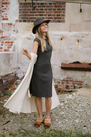 garden coat in dune over sheath dress in charcoal