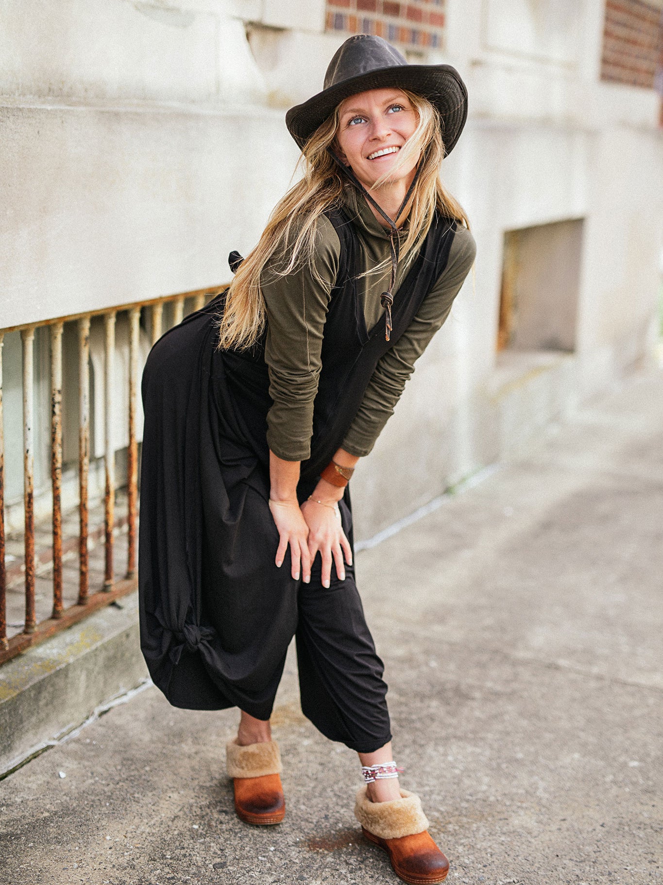 scuba hooded ski tunic in olive under black farmer jumpsuit