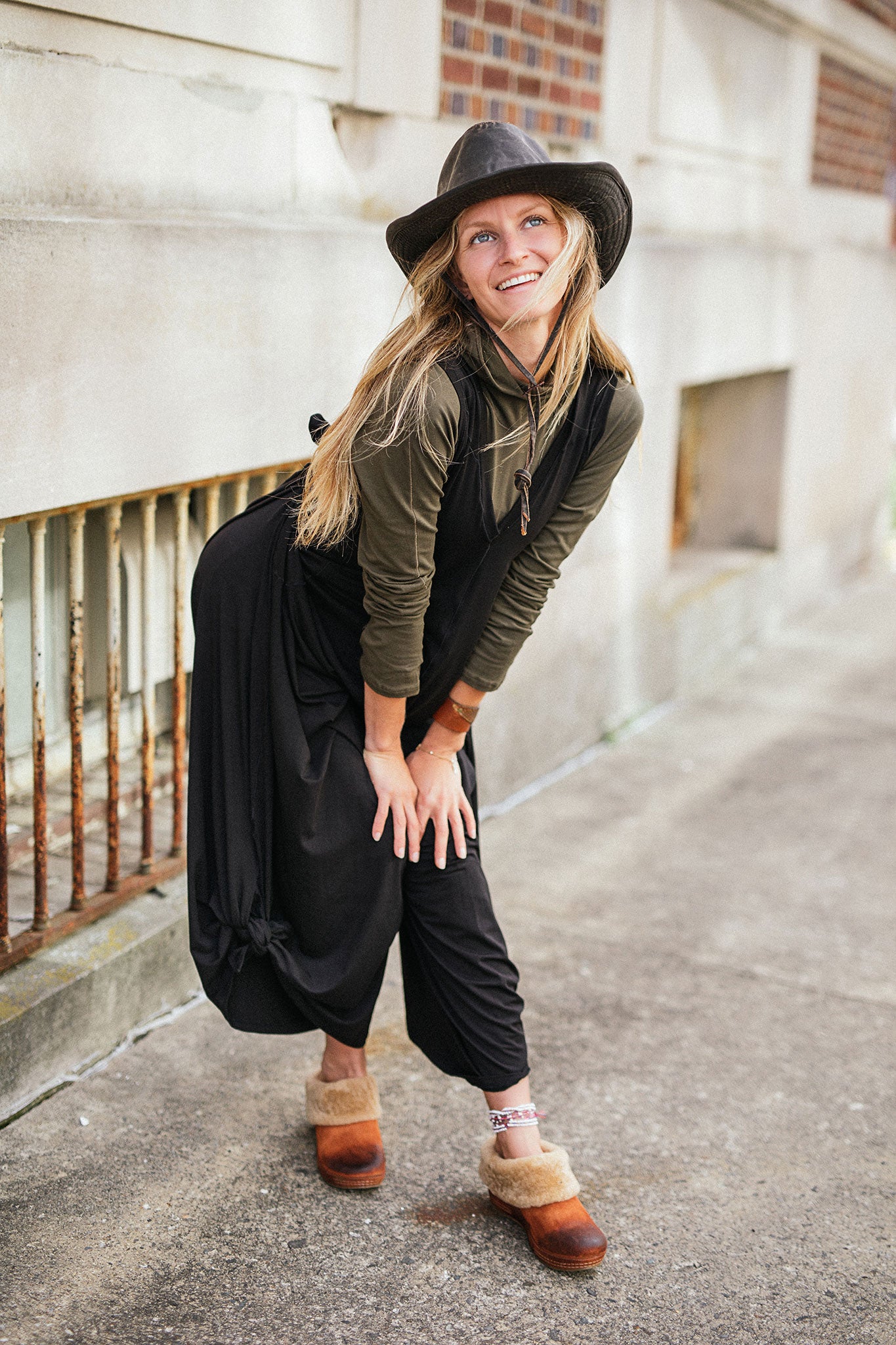 scuba hooded ski tunic in olive under black farmer jumpsuit