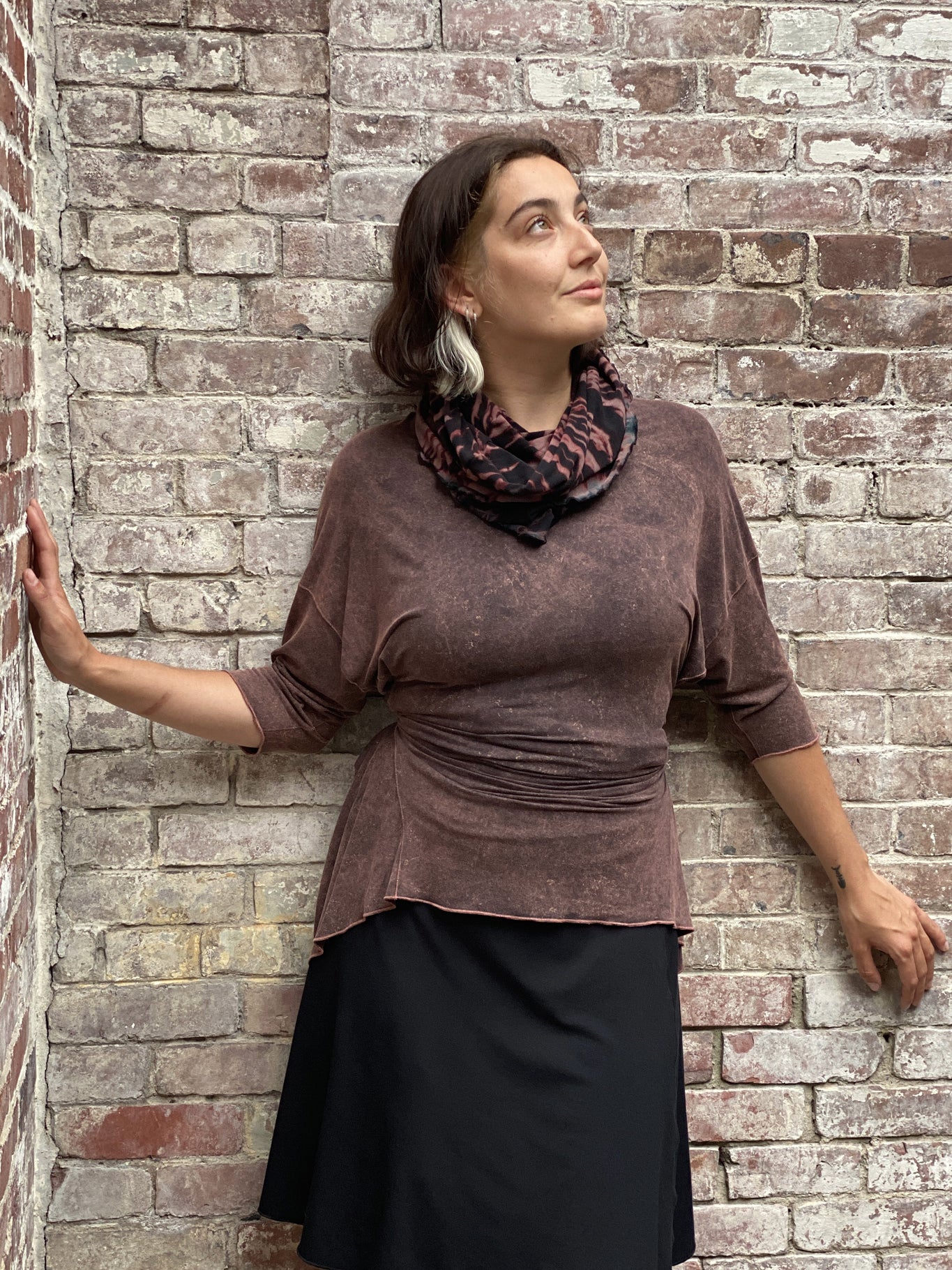 flip skirt in black styled with reef mineral true pearl 