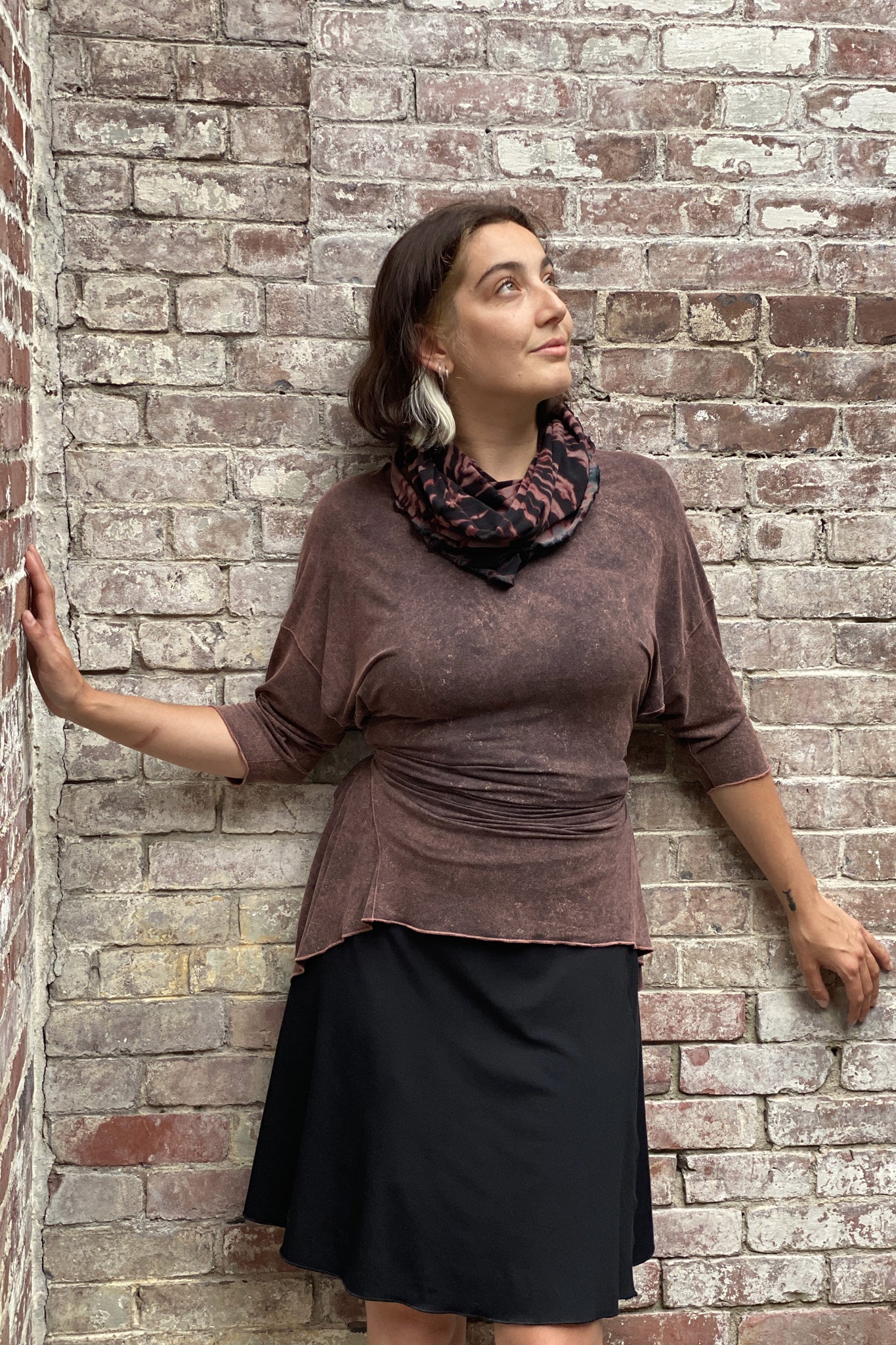 flip skirt in black styled with reef mineral true pearl 