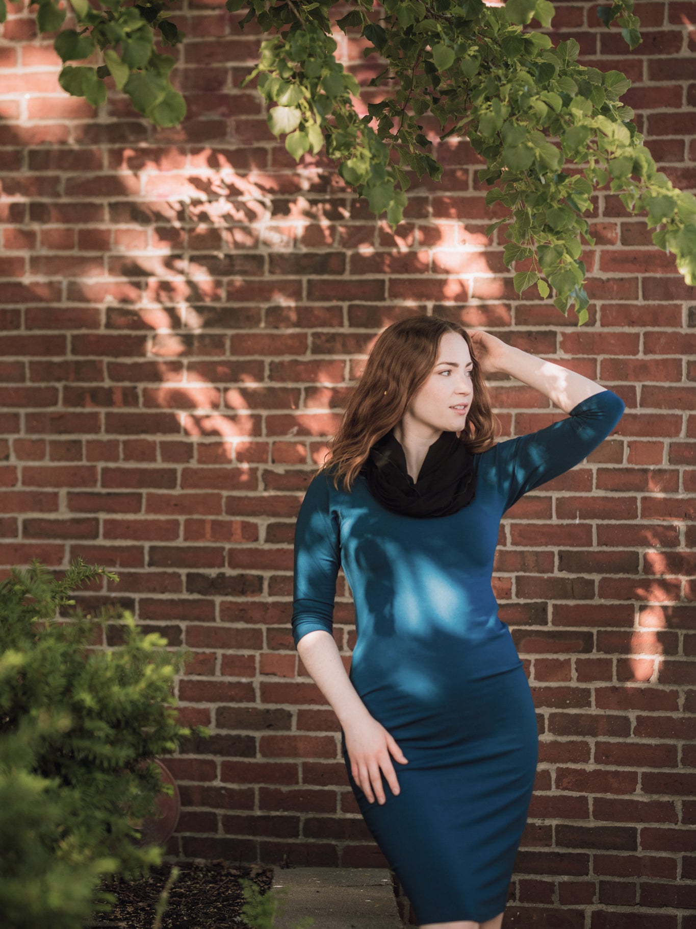 noble elegant dress in lagoon with black loop around neck