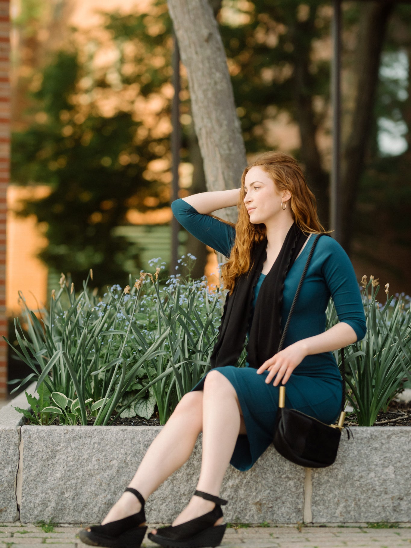 noble elegant dress in lagoon with black loop around neck
