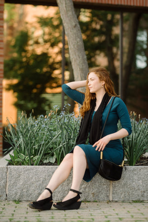 noble elegant dress in lagoon with black loop around neck