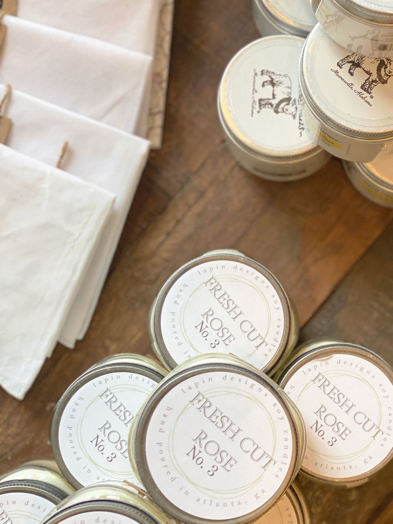 lapin soy candle in fresh cut rose