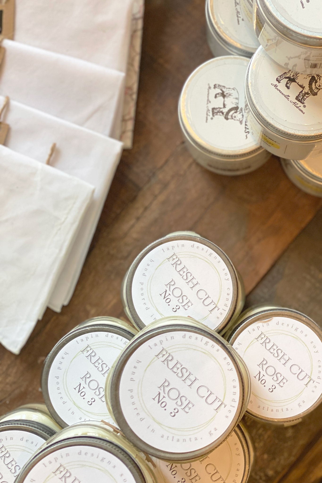 lapin soy candle in fresh cut rose