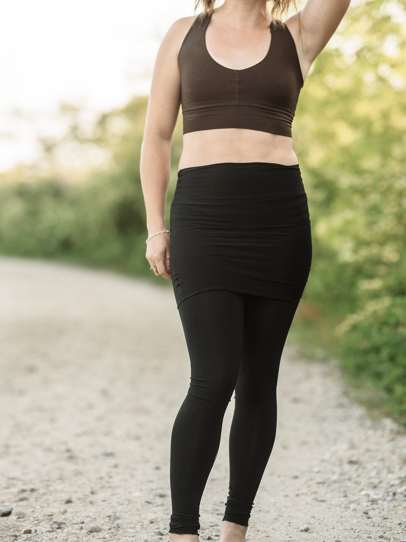 black playsuit as a skirt and legging piece