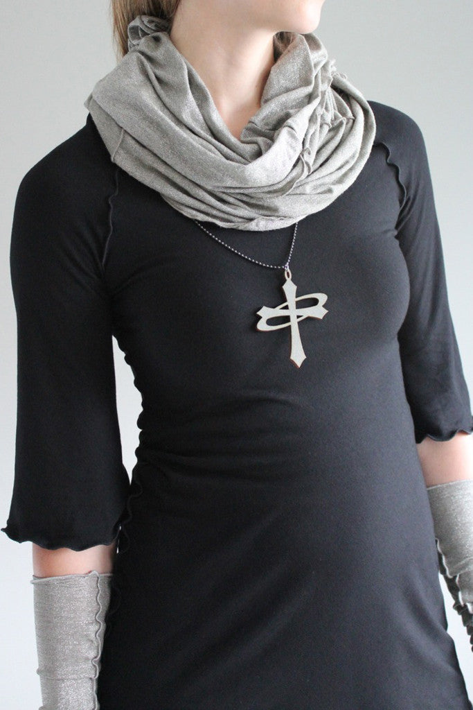 black ballet tunic by angelrox with pewter shimmer hourglass and opera sleeves. the angelrox logo represents balance