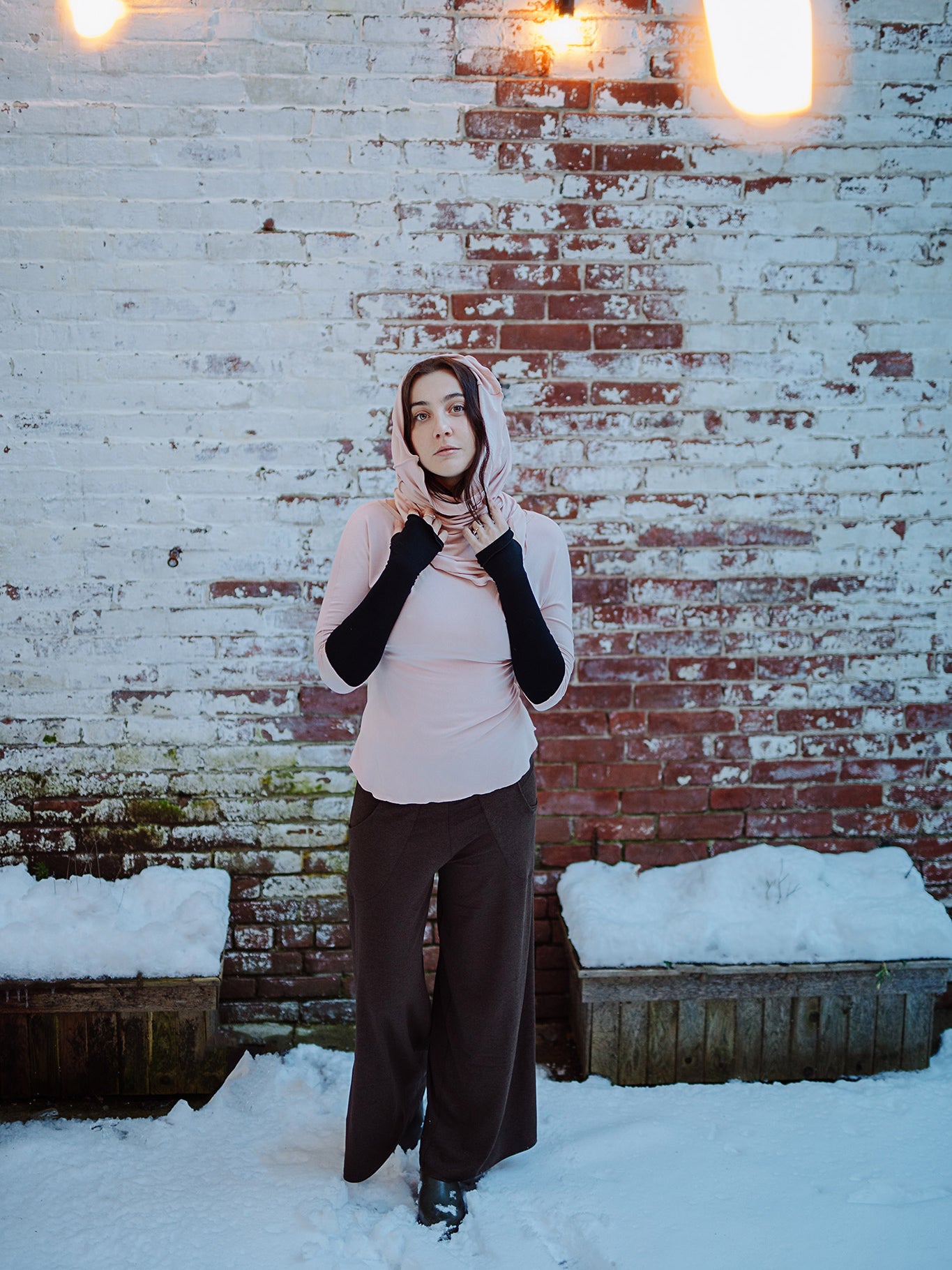 harlow elegant convertible wide leg pant in espresso paired with ballet rose top, ballet hourglass as a hood, and black opera sleeves