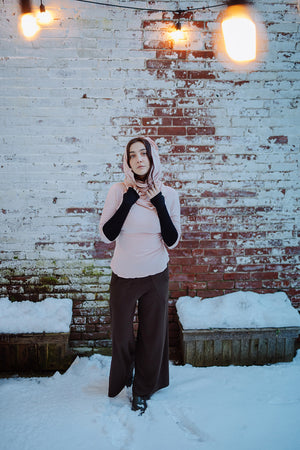 harlow elegant convertible wide leg pant in espresso paired with ballet rose top, ballet hourglass as a hood, and black opera sleeves